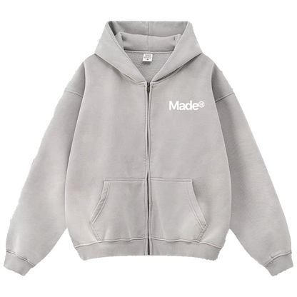 Gray hoodie with 'Made' logo on a white background